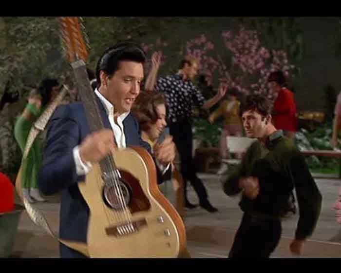 Christopher Riordan and Elvis Presley in the film Spinout.