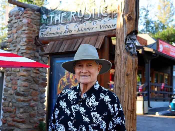 Christopher Riordan outside the Rustic Theatre