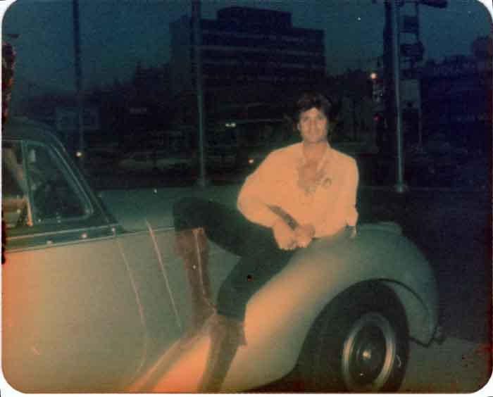 Christopher Riordan poses with his 1950 Bentley